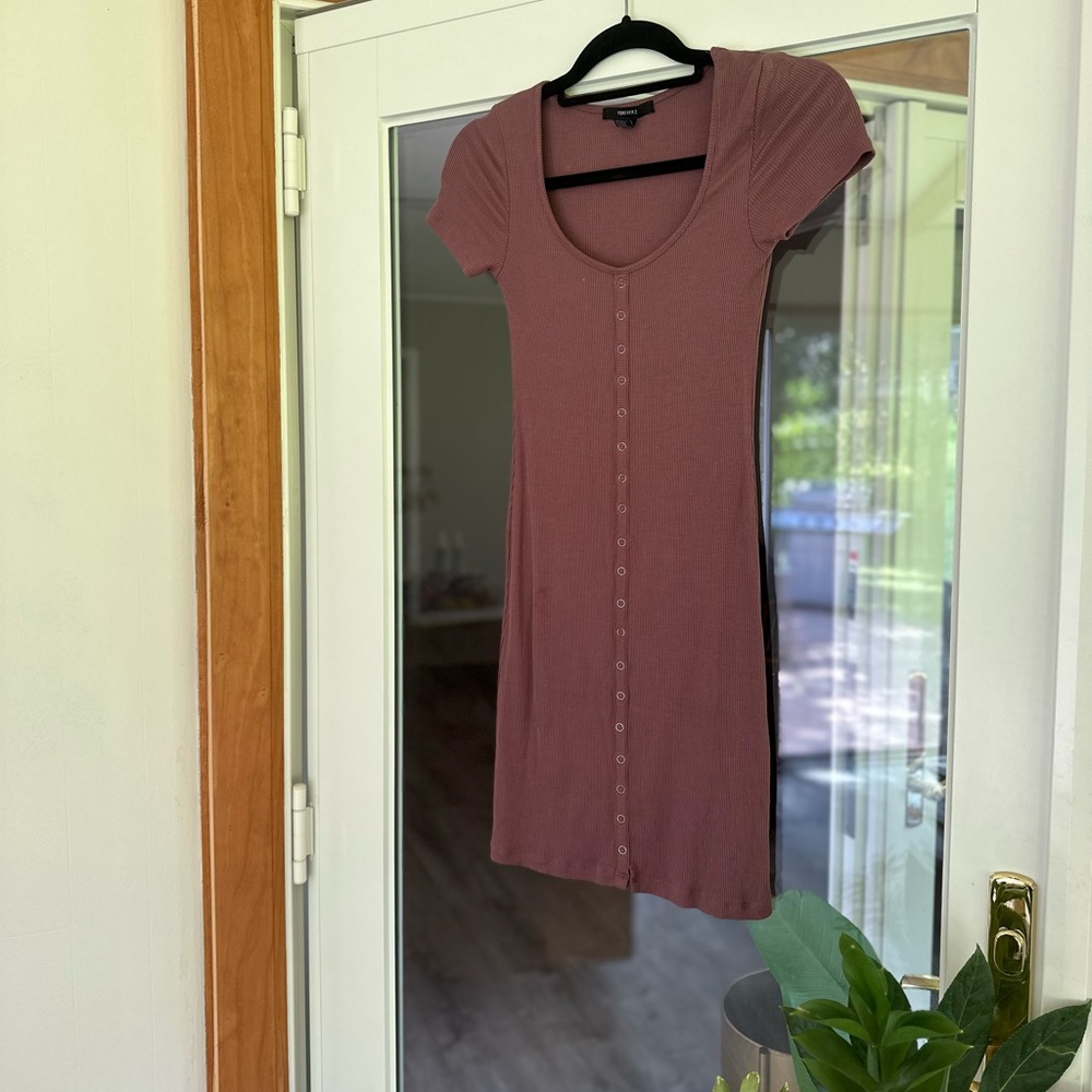 Mauve, ribbed cotton mini dress with *faux* snap enclosure detail.